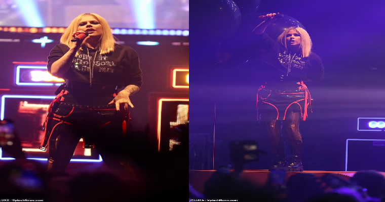 Avril Lavigne cuts an edgy figure as she commands attention on stage at her sold-out Manchester Apollo concert... after postponing UK tour
