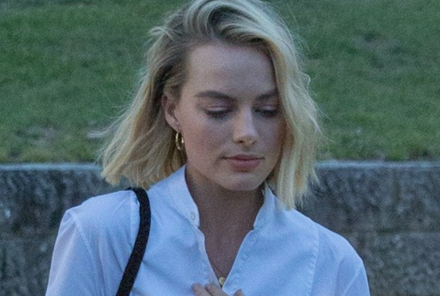 Margot Robbie Flaunts Her Leggy Figure As She Arrives At Bondi Icebergs After Flying Into