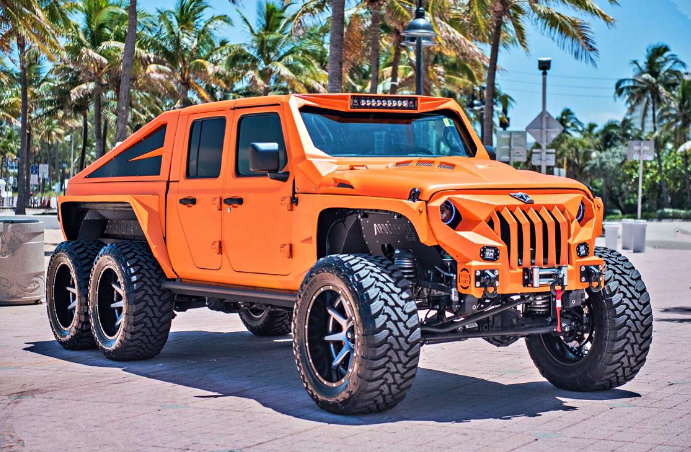 Close-up Of The Off-road Vehicle Known As The “terrain Monster” Apocalypse Hellfire 6×6 Extremely Unique Orange Version With An Engine Block Of More Than 783.7 Hp