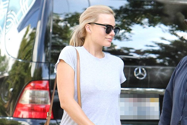 Margot Robbie Shows Off Her Toned Pins In Tiny Denim Cut Offs As She Steps Out In Hollywood 