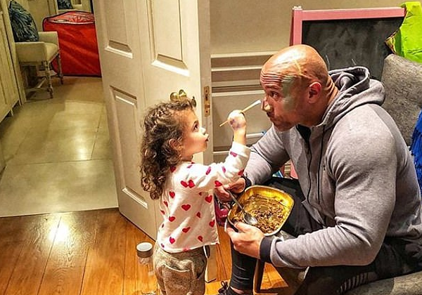 Dwayne 'The Rock' Johnson shows his soft side by letting his daughter Jasmine paint his face before leaving for work