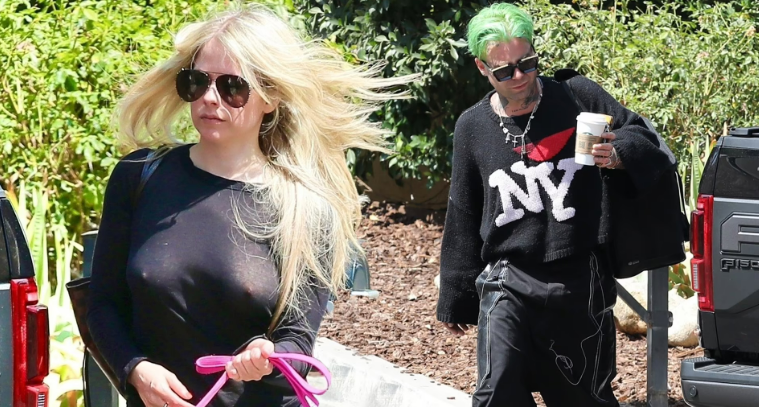 Avril Lavigne leaves little to the imagination as she goes braless beneath a see-through top as she and beau Mod Sun head to a friend's house