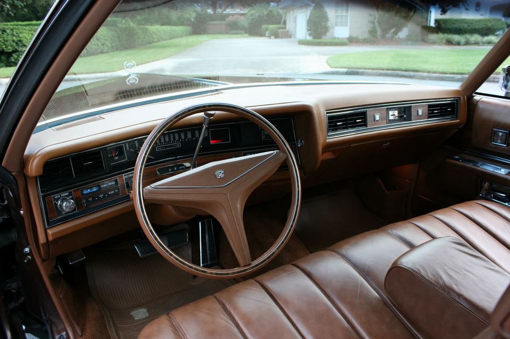 The luxurious interior of the 1973 Cadillac Coupe DeVille was designed to provide ultimate comfort and style for its occupants.