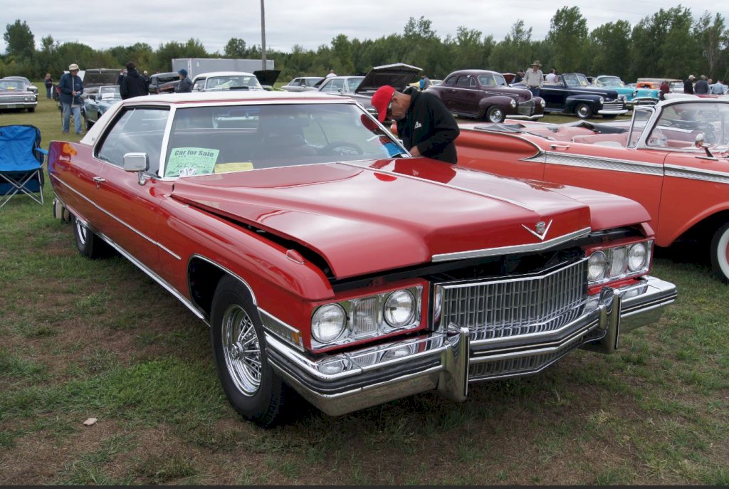The 1973 Cadillac Coupe DeVille featured a bold and imposing design, showcasing the brand's dedication to luxury and prestige.