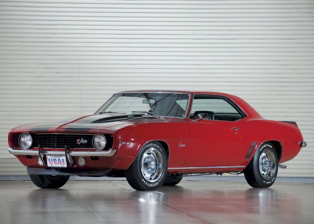 The 1969 Camaro Z28 came standard with a close-ratio Muncie M21 4-speed manual transmission, which provided quick and precise gear shifts, enhancing the car's performance capabilities. 