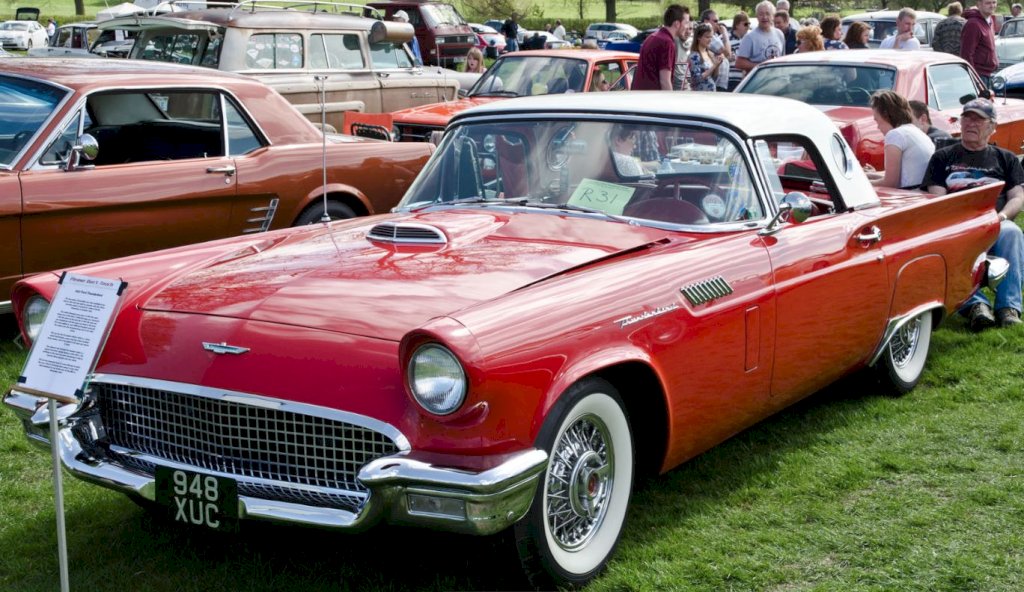 The 1957 Thunderbird's design is a masterful combination of elegance and sportiness, with a sweeping, aerodynamic profile that is both eye-catching and functional. 