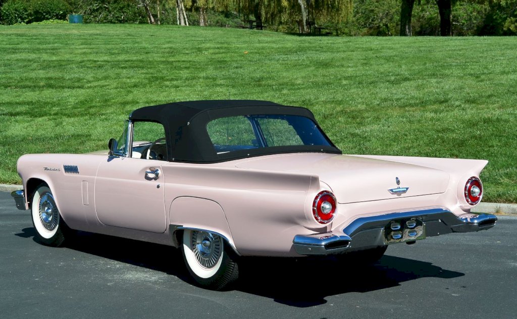 The 1957 Thunderbird was available with a variety of top options, including a removable hardtop with distinctive porthole windows, a folding soft top, or the option to have both.