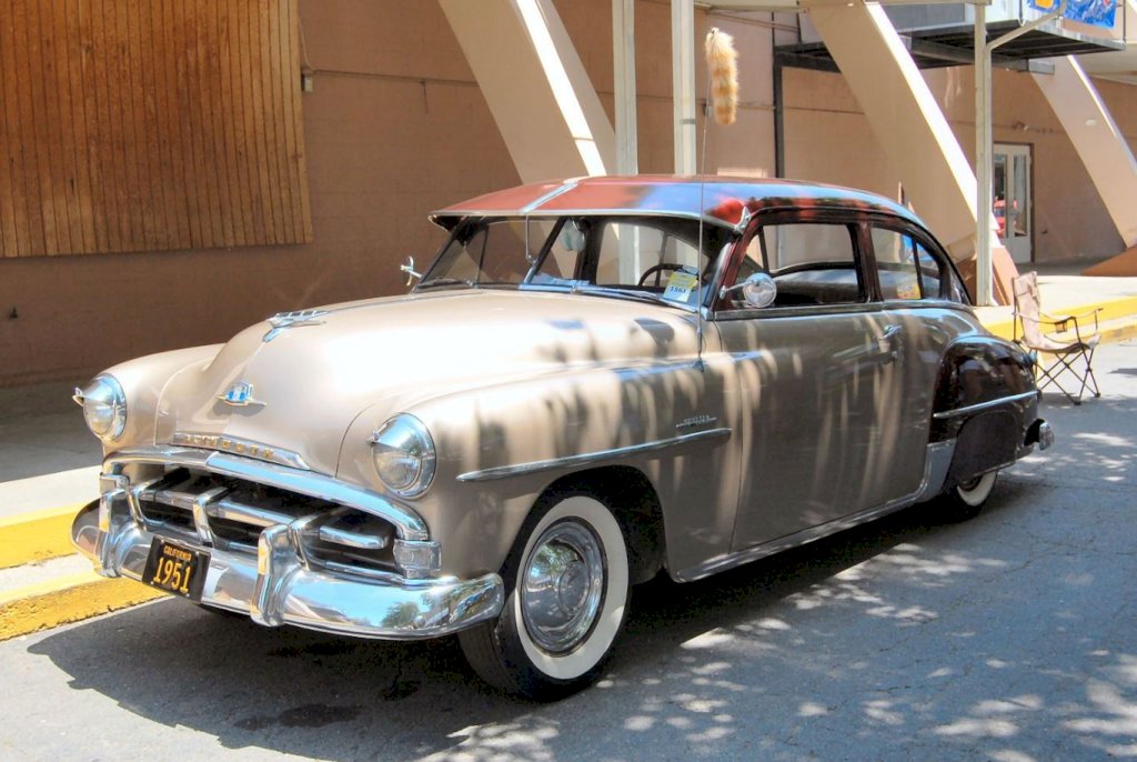 The exterior design of the 1951 Plymouth Concord was characterized by its rounded, aerodynamic body, which was a departure from the more angular shapes of pre-war automobiles. 
